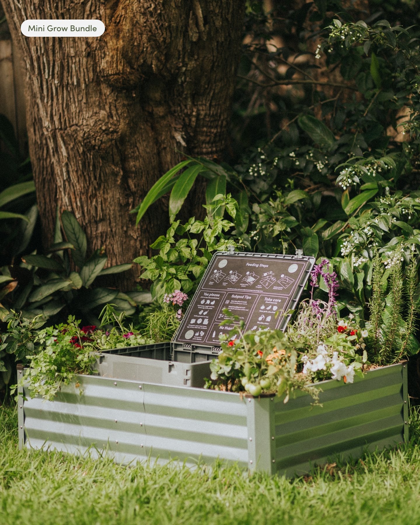 Agave green Subpod Mini Compost Bin and Worm Farm in a raised garden bed  - Subpod US