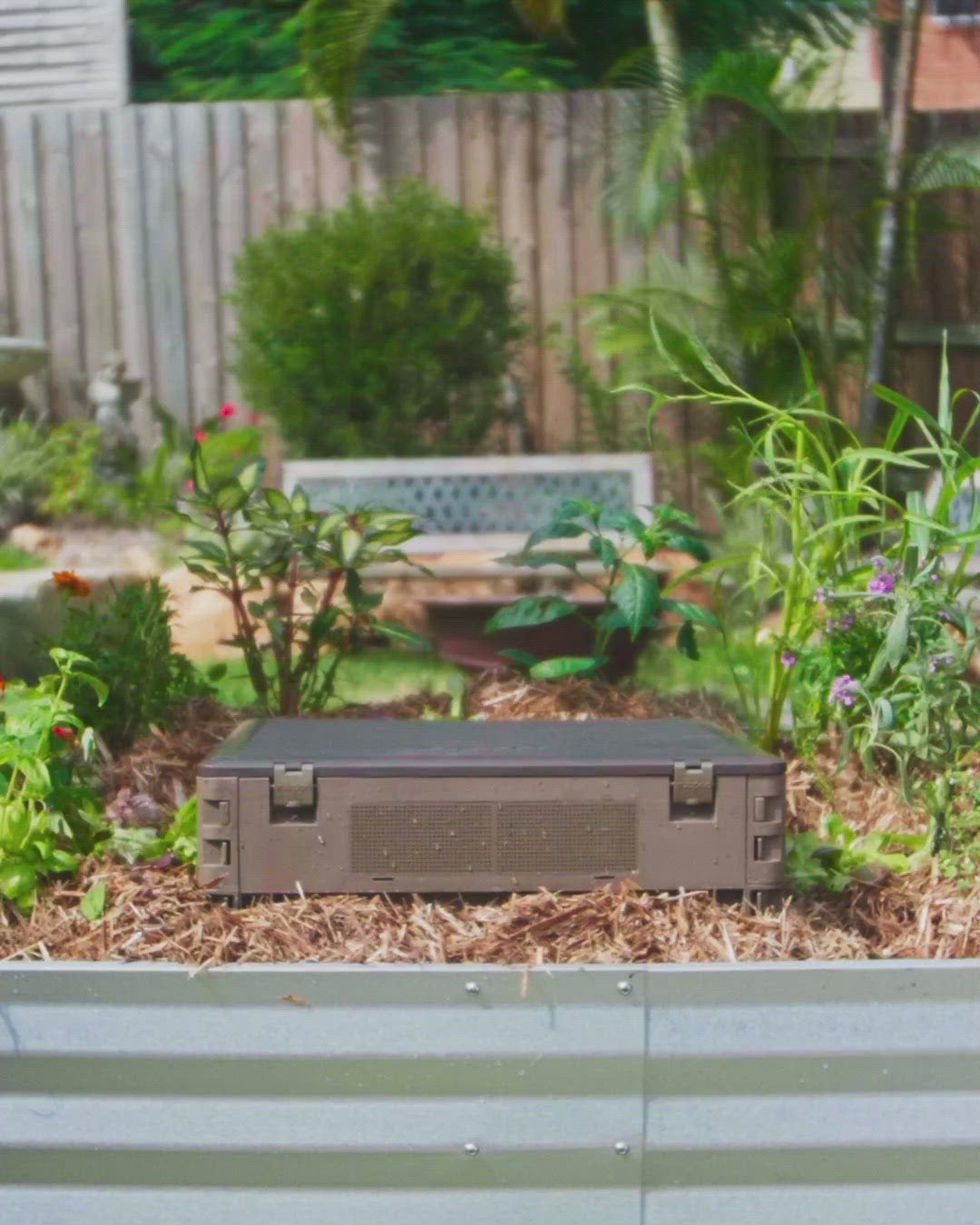 video showing the subpod mini compost bin and worm farm being assembled and used to compost food waste at home